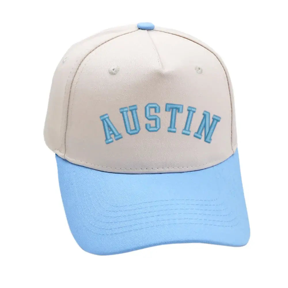 Sky blue Austin hat with 3D embroidery, adjustable fit, unisex design, perfect for stylish comfort.