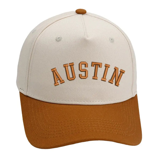 Austin hat in orange and beige, featuring premium 3D embroidery and adjustable buckle for a perfect fit.