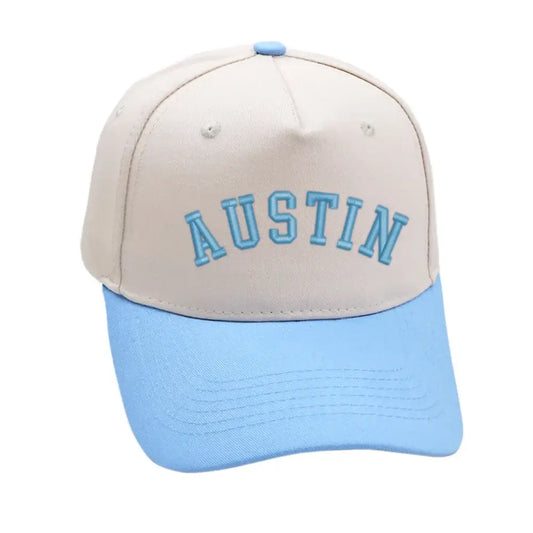 Sky blue Austin hat with 3D embroidery, adjustable fit, unisex design, perfect for stylish comfort.